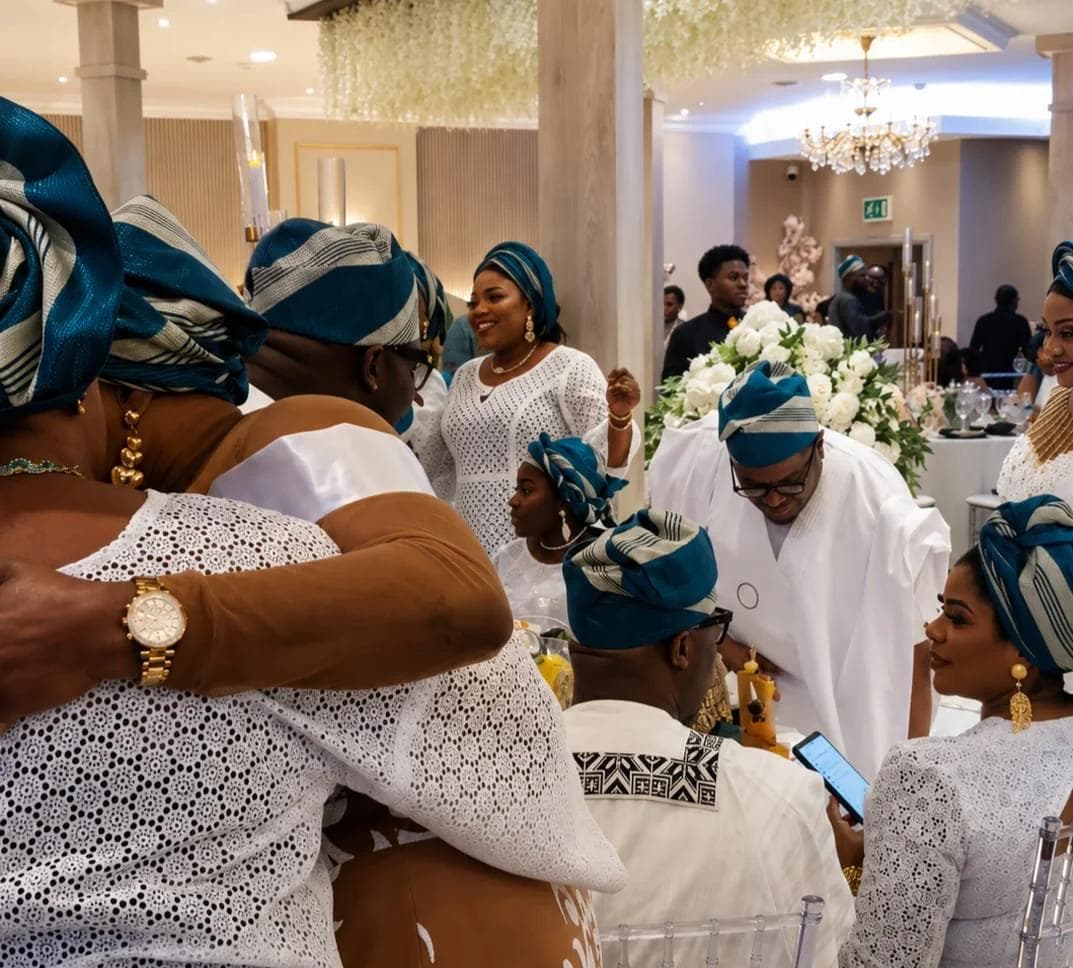 Guests embracing during the celebration.